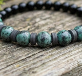 Handmade Boho Bracelet – Greenish-Gray Speckled K2-Style Beads with Dark Spacer Accents & Gray Heishi