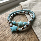 Handmade Beaded Friendship Bracelet – Light Blue & White Beads with Brown Accents, Two Blue Star Beads, Playful Gift for Kids/Teens