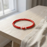 Handmade Red Beaded Bracelet with Spiral Charm – Elastic Jewelry with White Accent Beads