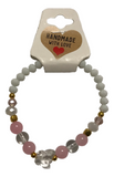 Handmade Bracelet – Pink & White Beads, Faceted Crystal-Style Butterfly Charm, Gold-Tone Accents, Elegant Gift Jewelry