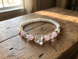 Handmade Bracelet – Pink & White Beads, Faceted Crystal-Style Butterfly Charm, Gold-Tone Accents, Elegant Gift Jewelry