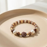 Handmade Wood and Pearl Beaded Bracelet Earth Tone Gemstone Seashell Charm Jewelry Coastal Boho Style