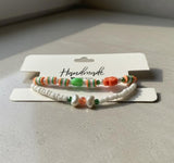 Handmade 2-Piece Bracelet Set with White Beads, Orange & Green Accents, Flower & Smiley Charms – Gift Jewelry, Boho Chic Style