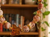 Handmade Beaded Stretch Bracelet with Warm Marbled Beads and Butterfly Centerpiece – Boho Gift Jewelry
