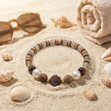Handmade Wood and Pearl Beaded Bracelet Earth Tone Gemstone Seashell Charm Jewelry Coastal Boho Style