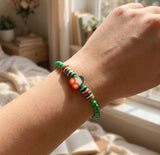 Boho Beaded Bracelet with Cherry Charm – Green Beads & Red-White-Green Accents, Handmade Elastic Jewelry