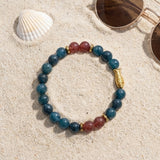 Teal Jade Beaded Bracelet with Gold Fish Charm, Stretch Boho Gemstone, Ocean-Inspired Jewelry, Teal Turquoise Bracelet, Handmade