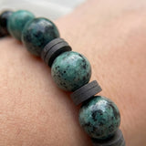 Handmade Boho Bracelet – Greenish-Gray Speckled K2-Style Beads with Dark Spacer Accents & Gray Heishi