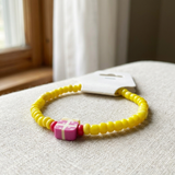 Handmade Yellow Beaded Bracelet, Pink Floral Accent, Playful Casual Jewelry