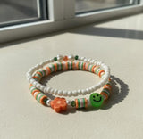 Handmade 2-Piece Bracelet Set with White Beads, Orange & Green Accents, Flower & Smiley Charms – Gift Jewelry, Boho Chic Style