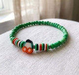 Boho Beaded Bracelet with Cherry Charm – Green Beads & Red-White-Green Accents, Handmade Elastic Jewelry