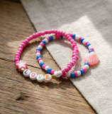 Handmade Love & Shell Beaded Friendship Bracelet Set (2 pcs) – Pink Star, Pastel Shell Charm & Letter Beads “LOVE,” Playful Jewelry Gift for Kids/Teens